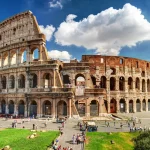Colosseum or Coliseum in Rome, Italy. Famous ancient Roman monument, world landmark.