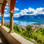 Beautiful view to Locarno city, lake Maggiore (Lago Maggiore) and Swiss Alps from Madonna del Sasso Church in Ticino, Switzerland.
