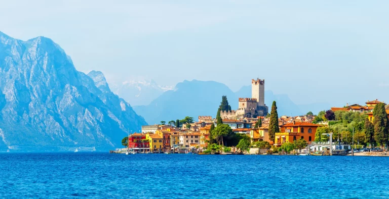 Ancient tower and colorful houses in malcesine old town