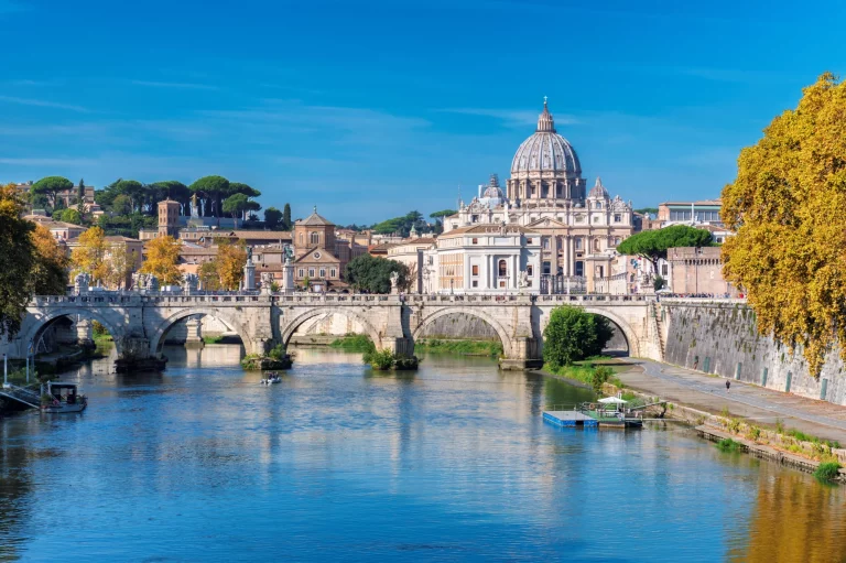Rome Skyline with Vatican St Peter Basilica at sunny autumn day, Rome Italy.