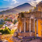 The Ruins of Taormina Theater at Sunset. Beautiful travel photo, colorful image of Sicily.